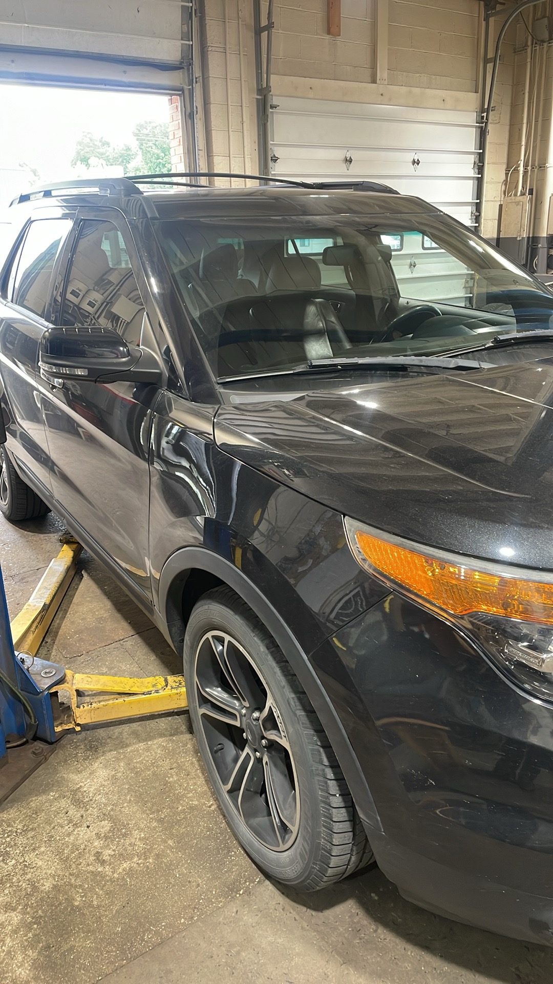 A vehicle in the automotive repair bay